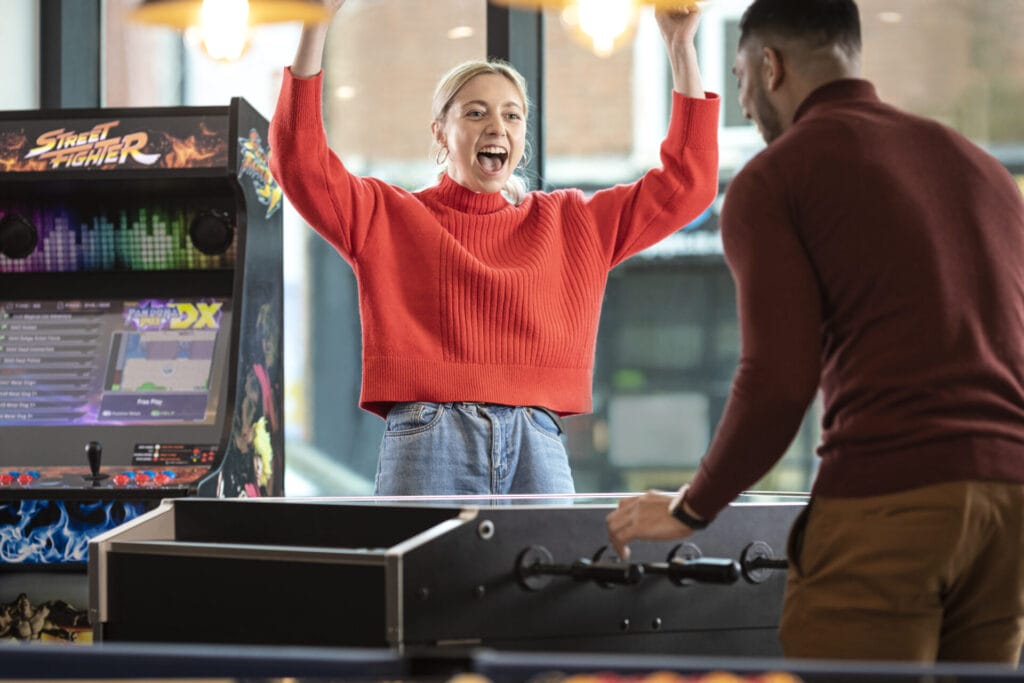 Leicester student accommodation with student playing in communal area