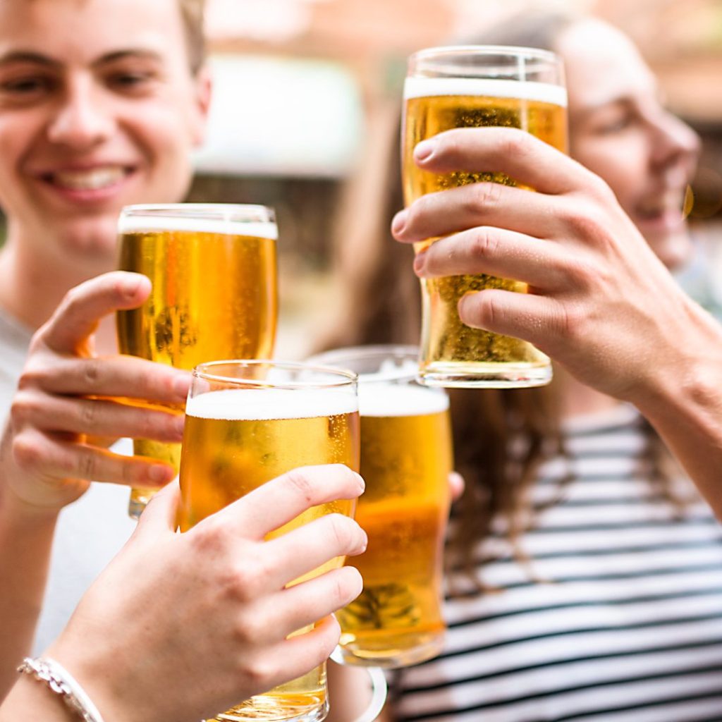 Students enjoying a pint of beer