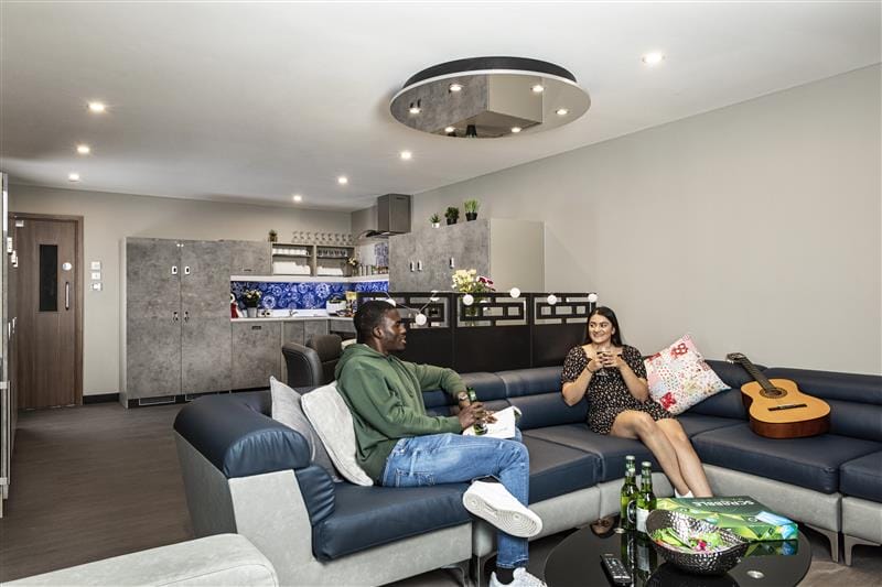Students enjoying communal living in a stylish shared accommodation at Talbot Street Nottingham