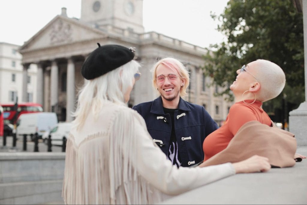 Students enjoying city life and socialising near historic landmarks in Bristol