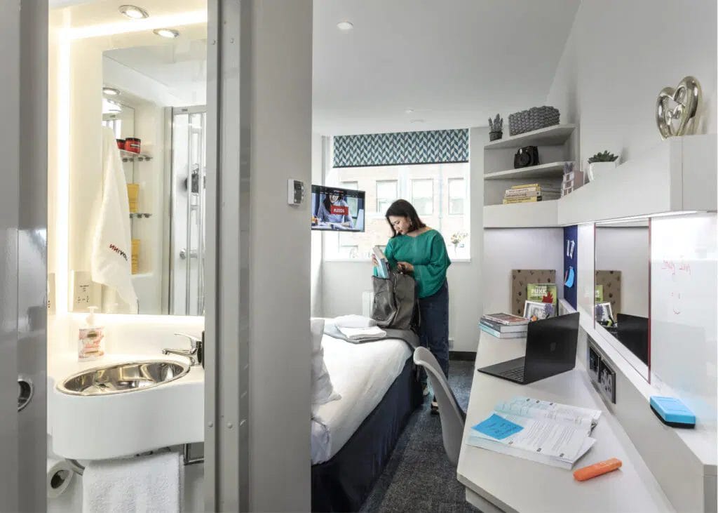Modern ensuite bedroom at Study Inn student accommodation in Leeds with a study desk and a private bathroom.